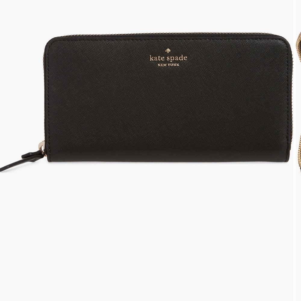 Kate Spade ‼️‼️
New York laurel way neda continental zip wallet